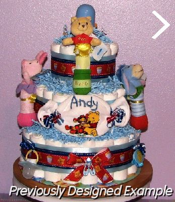 Personalized-Pooh-Diaper-Cake.JPG - Pooh Rattles Diaper Cake